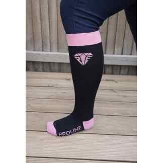 Freedom wide calf riding socks in black and pink, showing stretch fit and logo detail on the lower leg