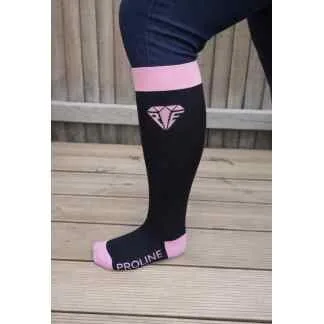 Freedom wide calf riding socks in black and pink, showing stretch fit and logo detail on the lower leg